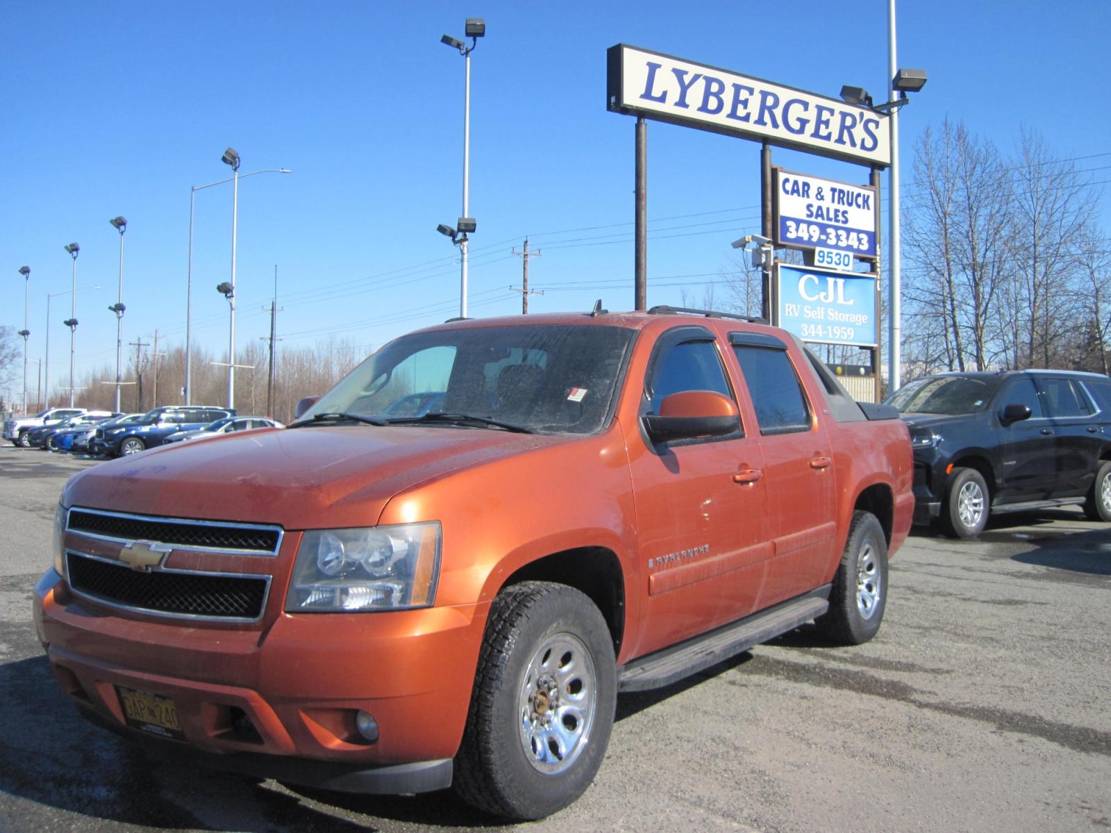 2007 Burnt Orange /Charcoal Chevrolet Avalanche LTZ 4WD (3GNFK12347G) with an 8 Cylinder Engine engine, Automatic transmission, located at 9530 Old Seward Highway, Anchorage, AK, 99515, (907) 349-3343, 61.134140, -149.865570 - Photo #1